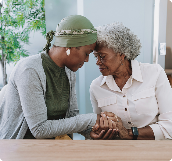 Caregiver and Alzheimer's patient during clinical trial visit, supporting medication adherence and symptom monitoring